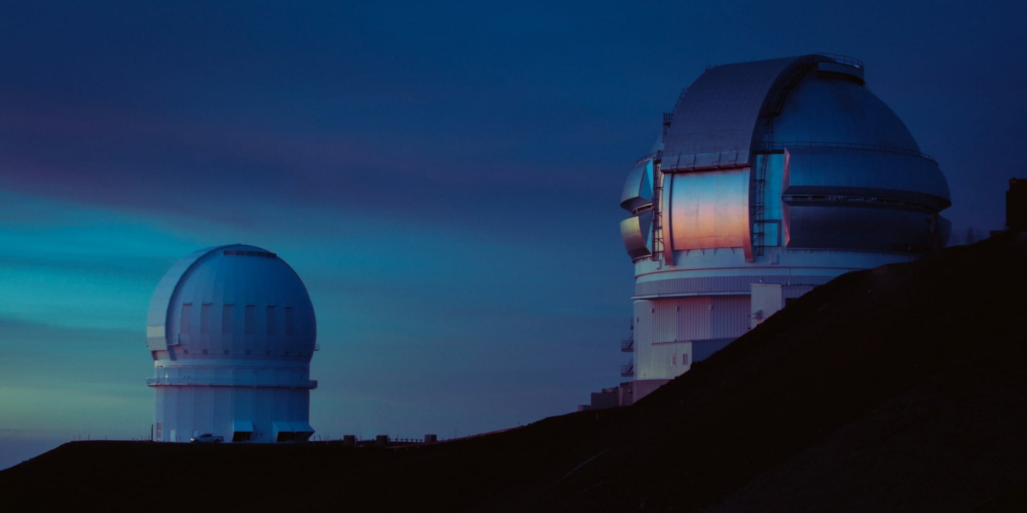 white dome building on top of mountain during daytime