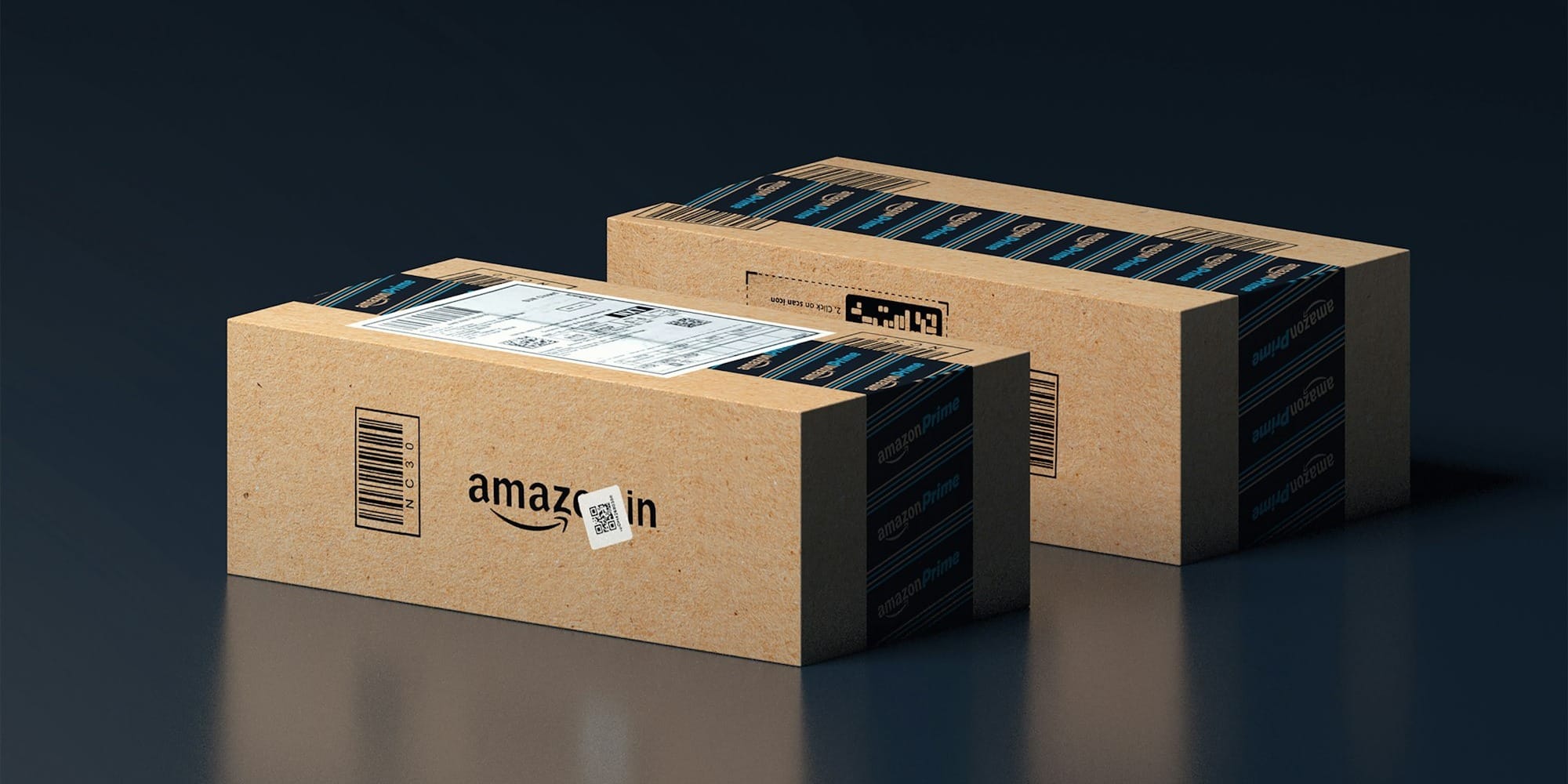 two boxes of amazon are stacked on top of each other